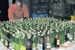 On raids police found 97 bottles of illicit liquor