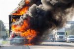 Truck clasps fire, three convicts discharge unhurt