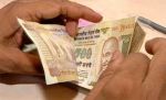 Rupee depreciated by 7 paise against USD