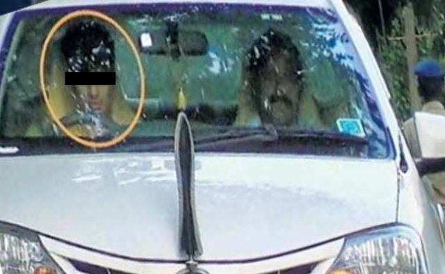 Kerala's teen seen driving a cop's car and it's his father's