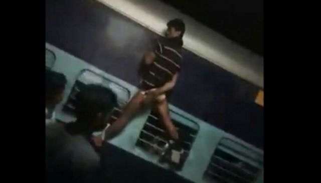 Trashing the humanity a man tied to a running train's window for drinking water