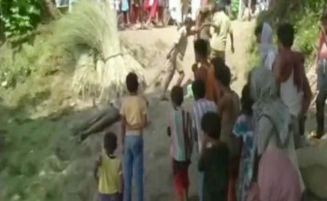 Bihar Police tied a rope around the neck of a dead man and drags the body