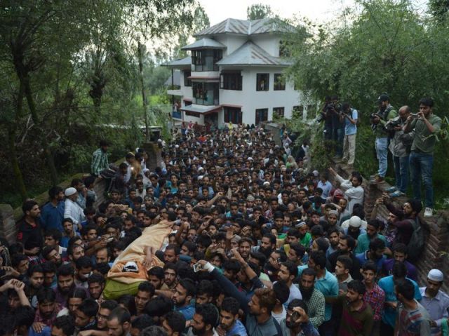 Burhan Wani death turned a massive clash, Curfew in Kashmir