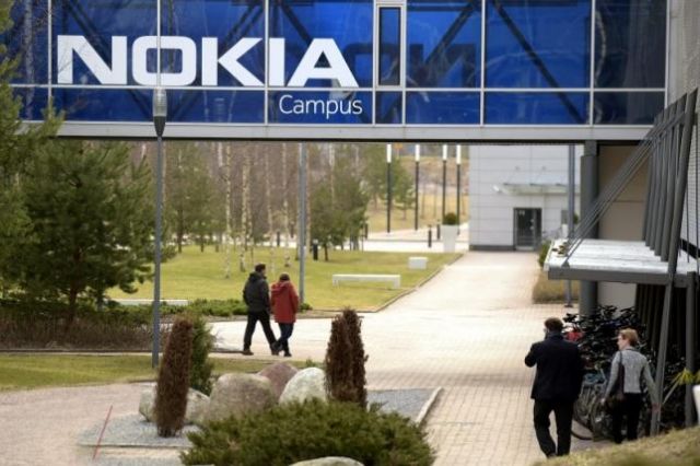 Nokia posts dropping network sales but lifts cost-saving goals