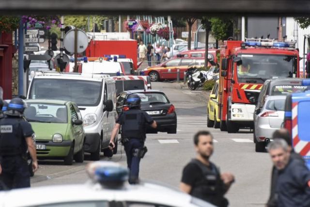 Islamist knifemen slit priest's throat at church in France