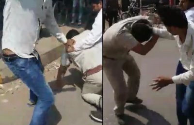 अयोध्या में पुलिसकर्मी को दबंगो ने जमकर पीटा, वीडियो वाइरल