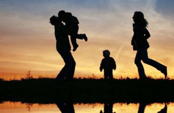 Toddler and a man reunited with their families