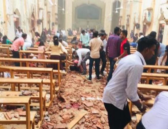100 injured in blasts at churches in Sri Lanka