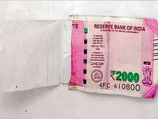 देश में पहला मामला, ATM से निकला 2000 का आधा नोट