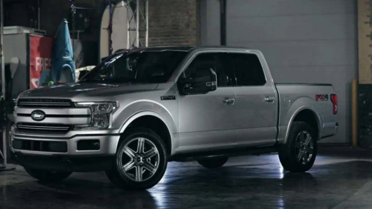 Ford Teases All Electric F 150 Pickup Truck By Pulling A