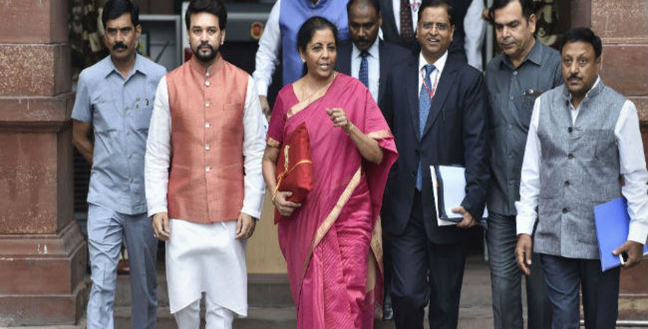 Finance Minister Nirmala Sitharaman says corporate tax for companies to be cut gradually