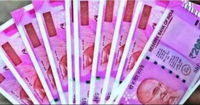 Rupee advances 12 paise against the dollar to close at 74.30.