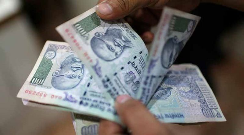 Rupee slips by 23 paise against dollar in early trade