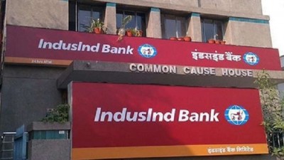 IndusInd net halves on provisions, denies merger