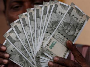 Rupee slips 24 paise against dollar