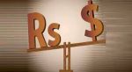 Rupee trading higher by 7 paise against dollar