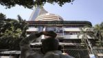 Revenue booking, overall cues drag Sensex, Nifty lower