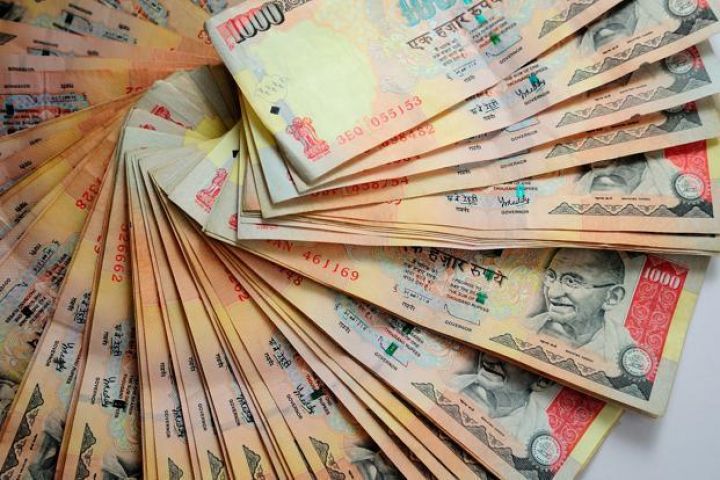 Rupee edged up 4 paise against USD
