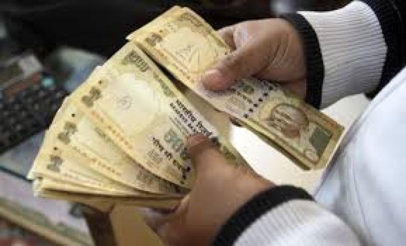 Rupee trading lower by 13 paise against US dollar