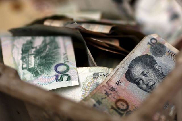 डॉलर के मुकाबले युआन में आई कमजोरी