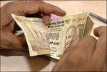 Rupee gains 17 paise against dollar