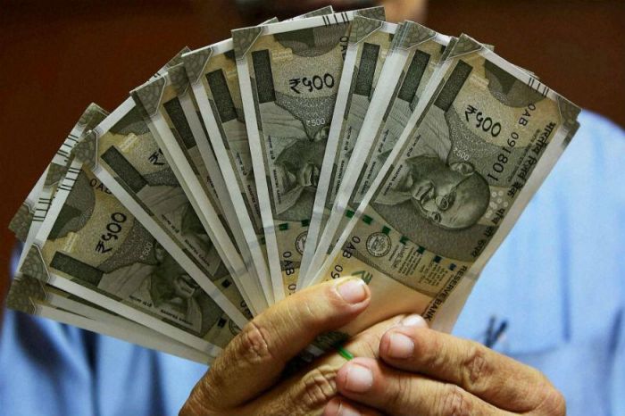 Rupee 2 paise down at 68.06 against dollar