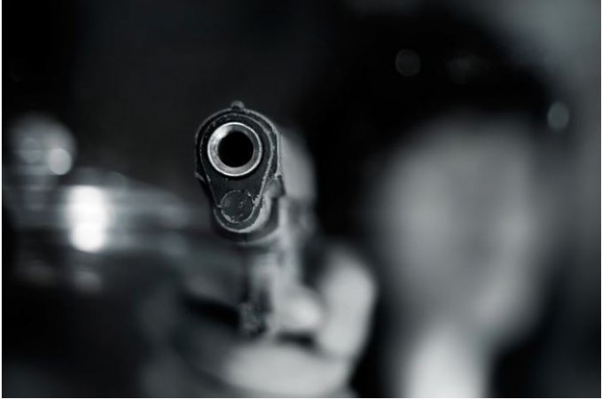 U.P. Bank guard opens fire at a customer trying to enter without mask