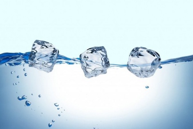 Ice floats in water but why does it sink as soon as it goes into alcohol? this is the answer