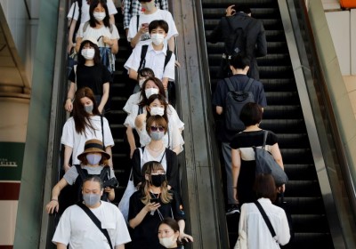 Japan to loosen regulations on work for foreigners