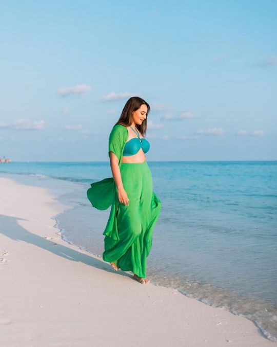 Sonakshi strikes a breezy pose in a bikini by the seaside