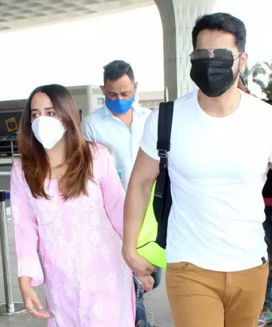 Varun was spotted at airport with wife, picture went viral on social media