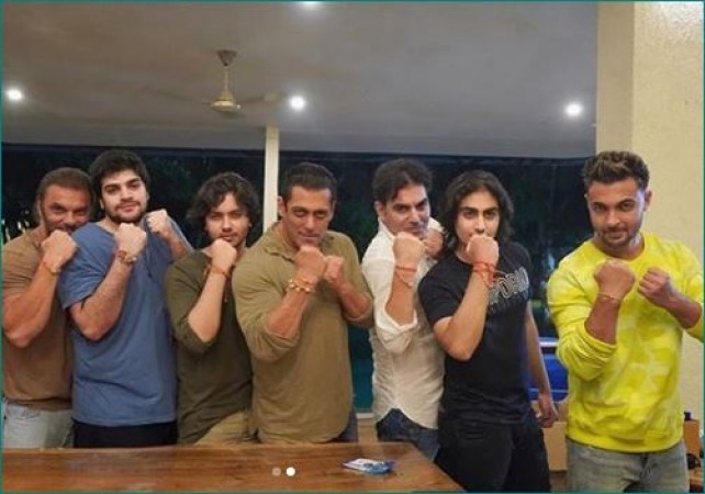 Salman shares picture while flaunting Rakhi with brothers