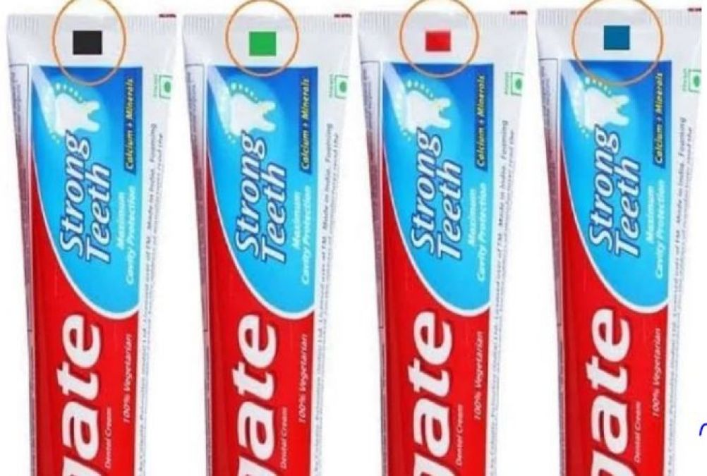 What do the different colored strips on the tube of toothpaste mean?