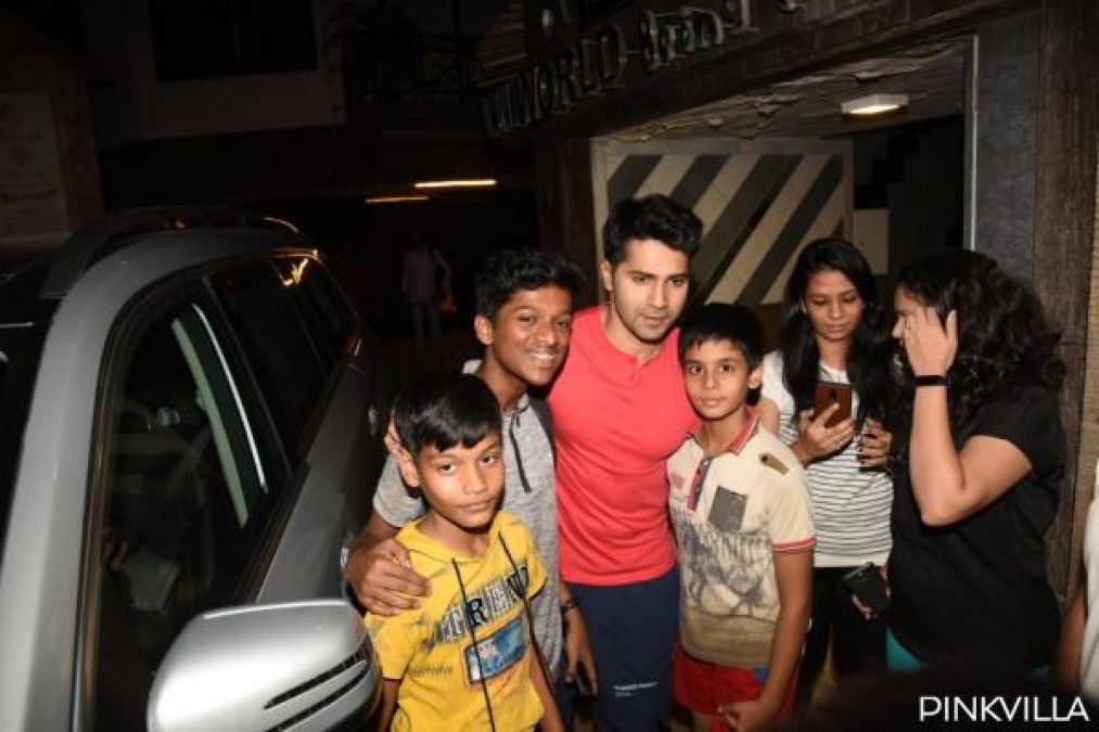 Varun Dhawan clicks photo with his younger fans out of gym