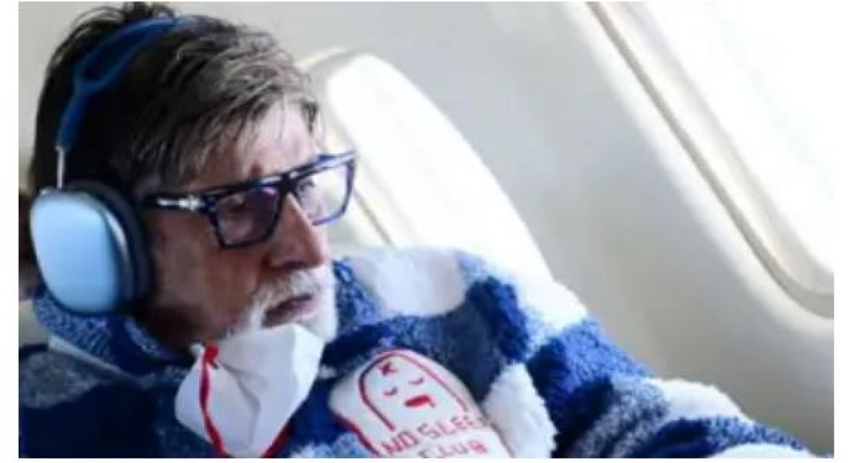 When the user asked the question when he was tired, Amitabh Bachchan pointed towards the jacket.