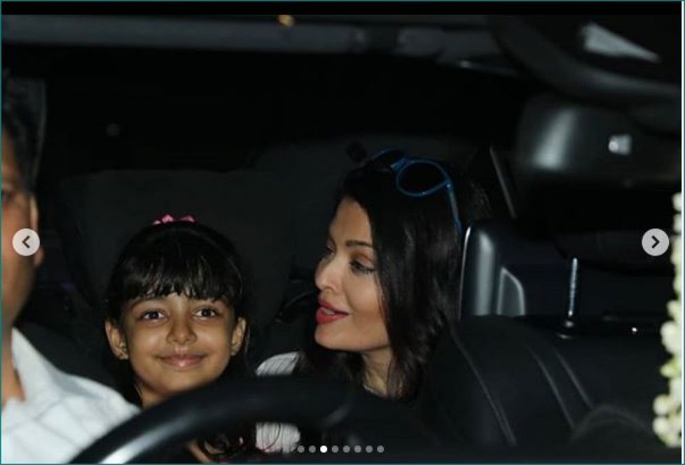 Aaradhya Bachchan seen smiling in the car with her mother