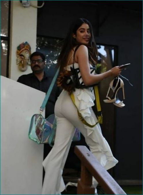 Janhvi Kapoor spottef outside the gym with a sandals in her hands