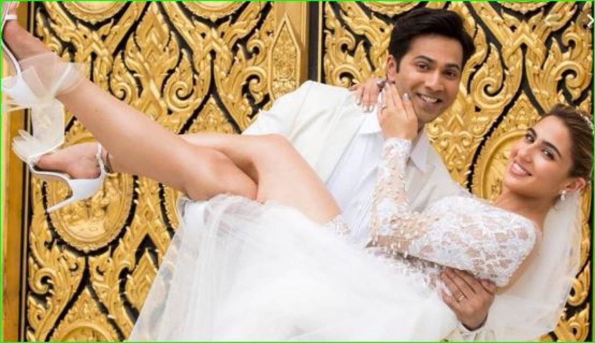 New poster of Coolie number 1 surfaced, Varun-Sara seen as bride and groom