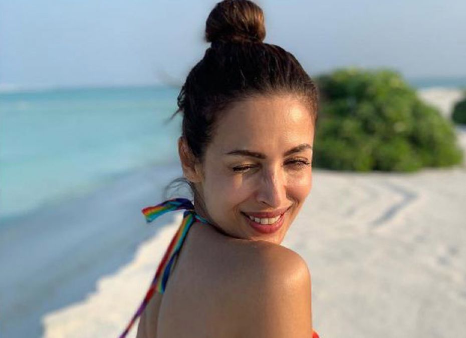 Malaika Arora appears in fun mood while sitting on scooter, shares picture