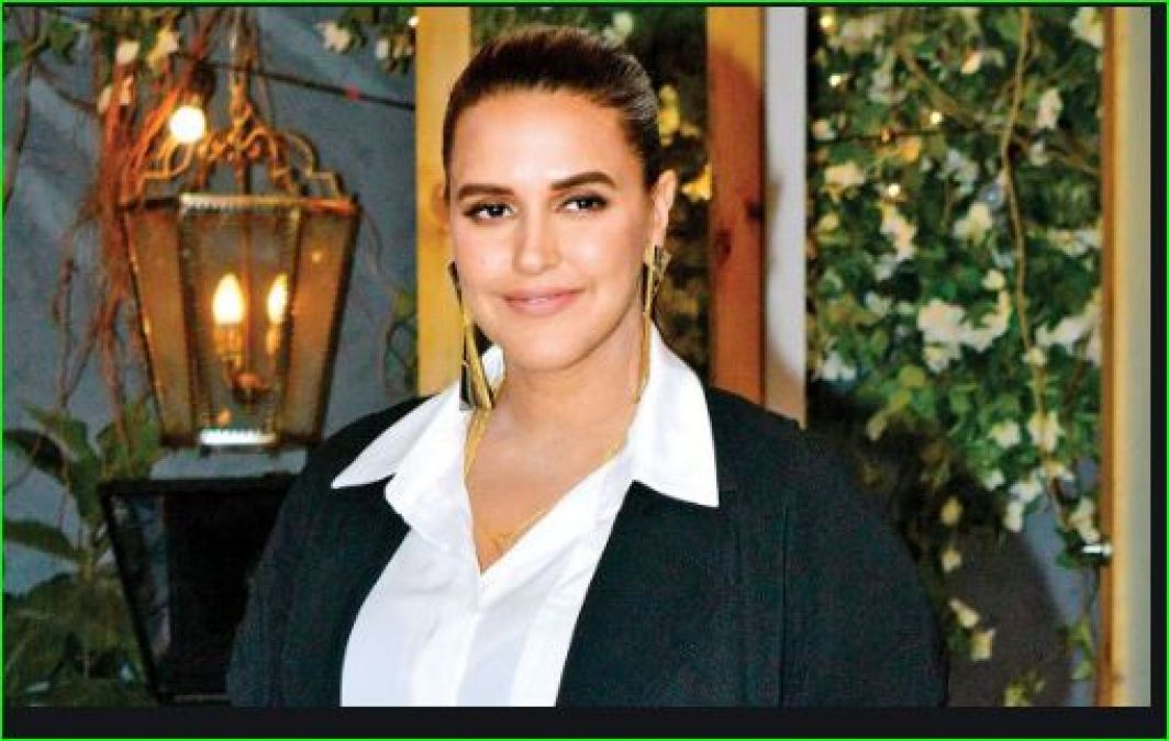 Neha Dhupia is happy to complete two decades in Bollywood industry