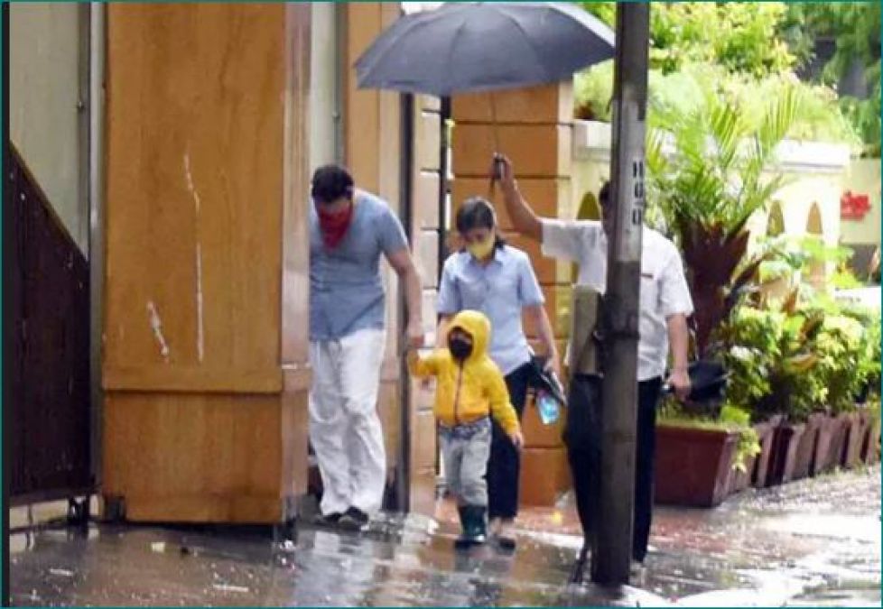 Taimur Ali Khan spotted enjoying rain with his father