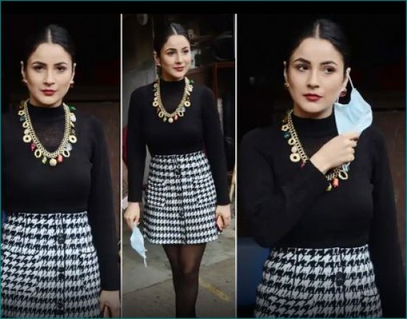 Shehnaaz Gill's glamorous looks wearing a black top and white skirt