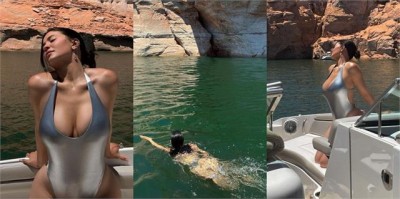 Kylie Jenner sets fire to water in silver monokini
