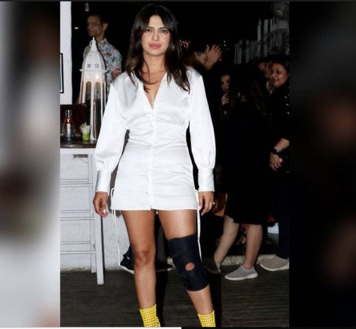 Priyanka sizzles in short dress, Mangalsutra and knee injury at film's Wrap-up party