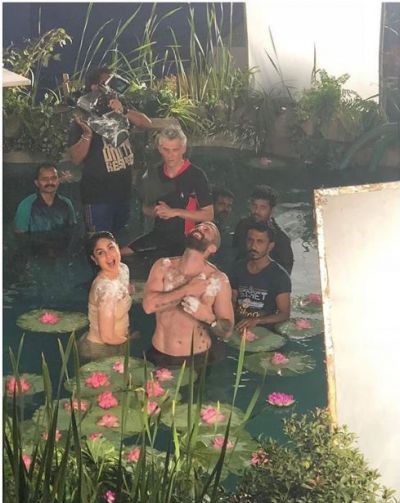 Viral Post: Kareena Kapoor taking a picture in the pool with an unknown young man