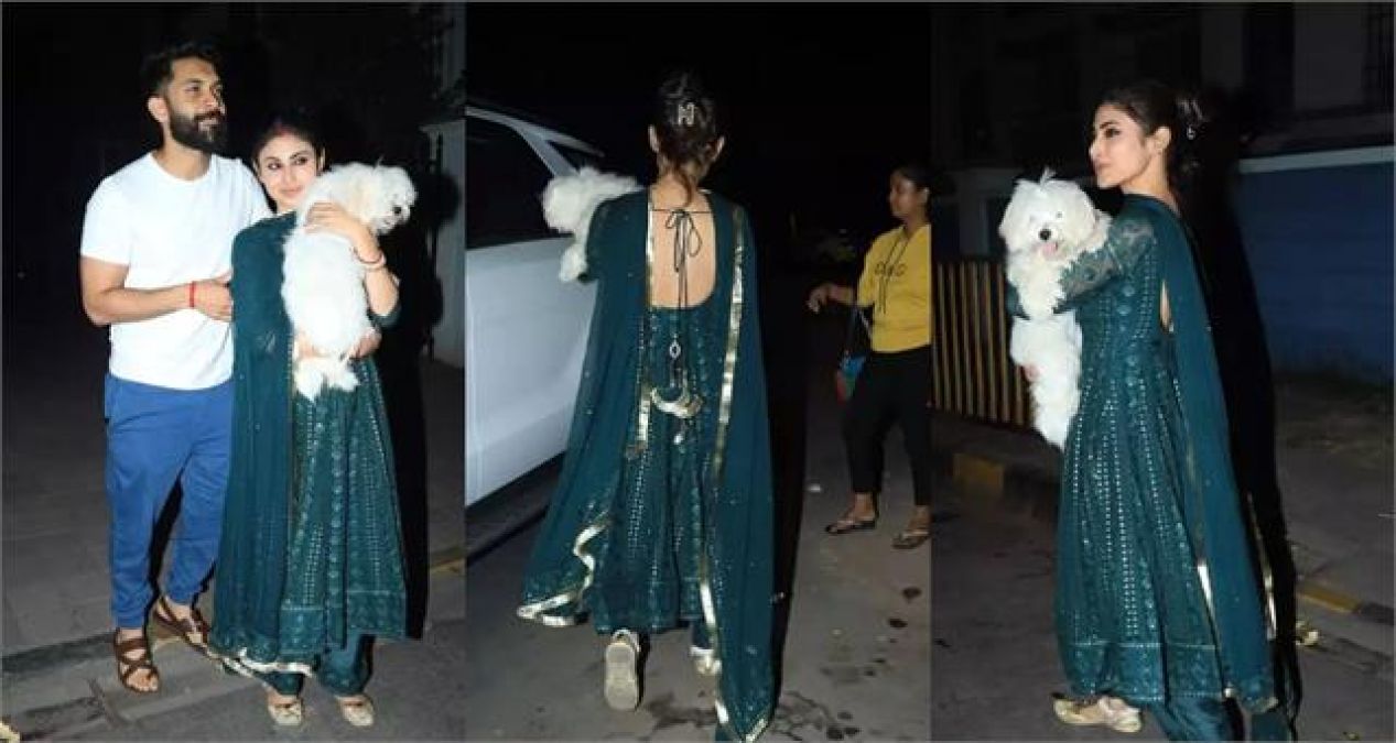 Backless suit...Kajrare Nain..Mouni Roy was seen with her husband