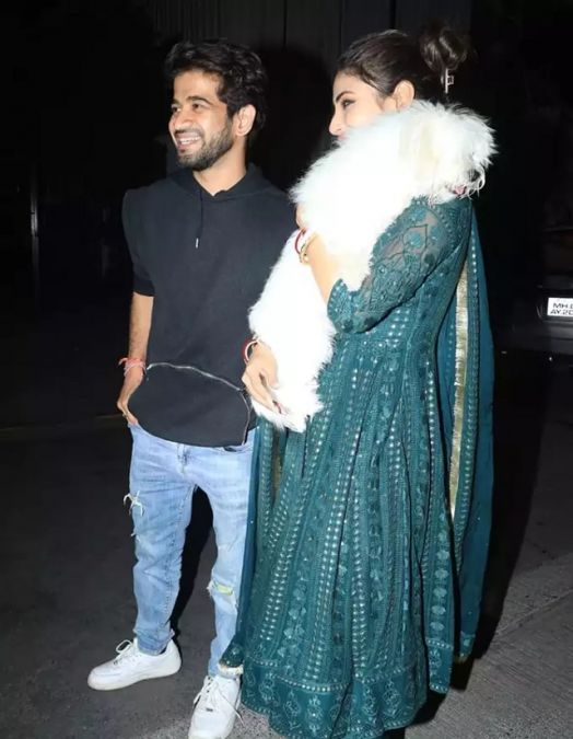 Backless suit...Kajrare Nain..Mouni Roy was seen with her husband