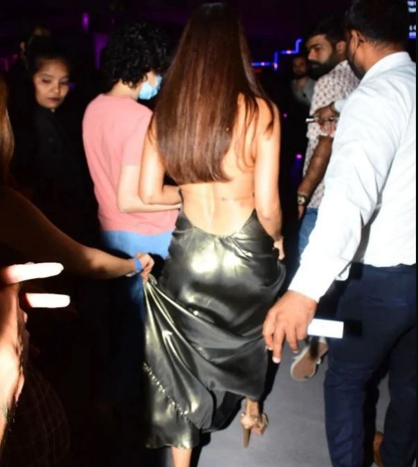 Malaika Arora walks out in backless strappy dress, someone grabbed gown and someone held the hand