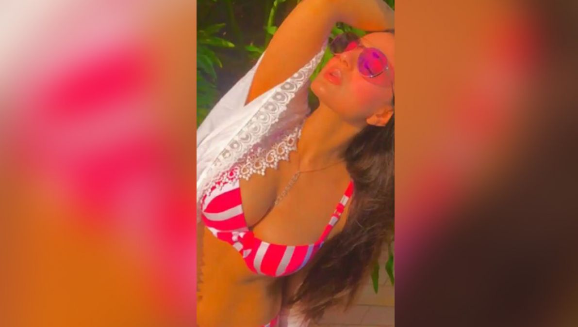 Ameesha in a white bikini sets social media on fire...