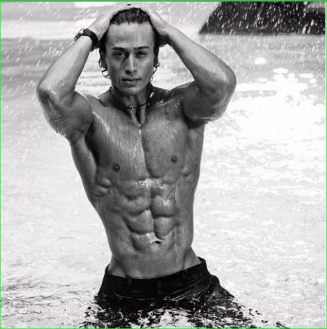 Tiger Shroff flaunts his washboard abs in a shirtless throwback pic ,celebs reacts